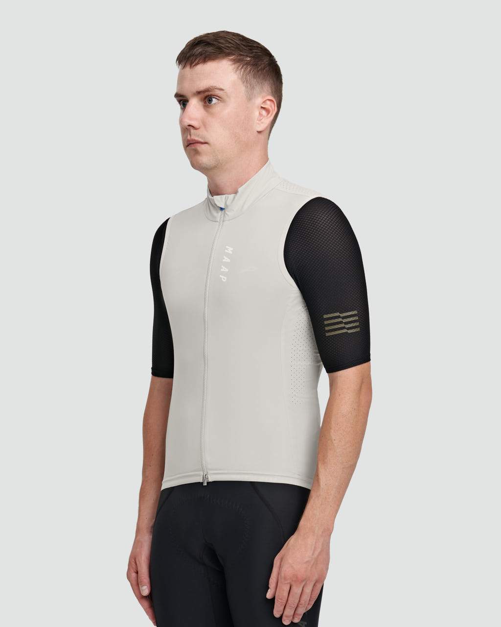 MAAP Draft Team Vest in Fog, vest front worn by rider