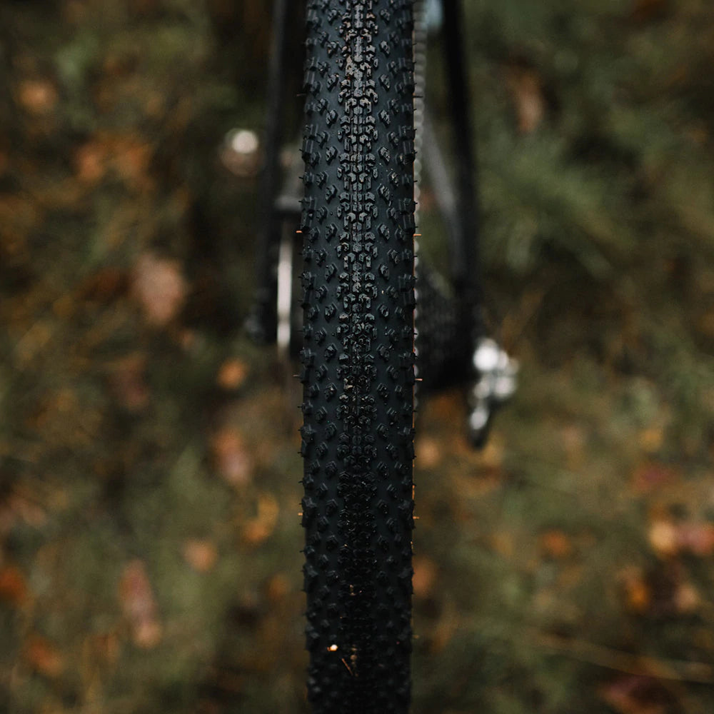 Goodyear Connector Tyre from the front with a grassy outdoor background