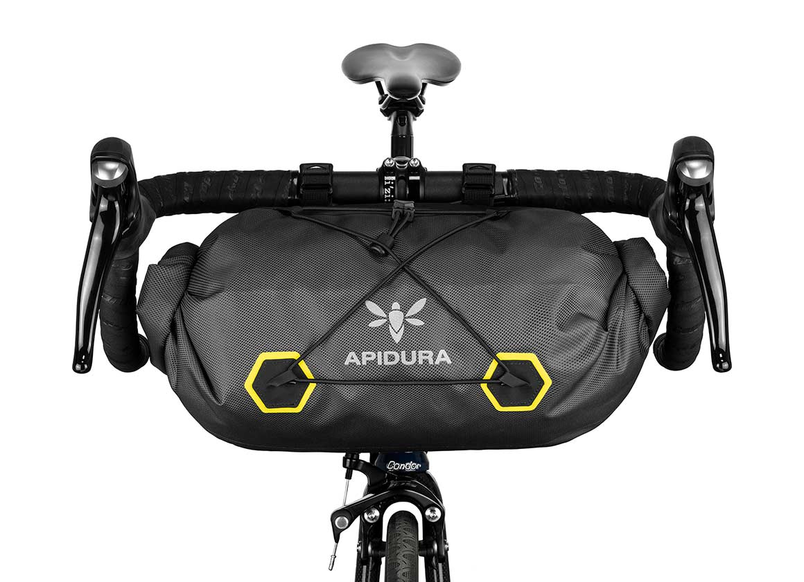Apidura Handlebar 14L Bag on front of handlebars from the front