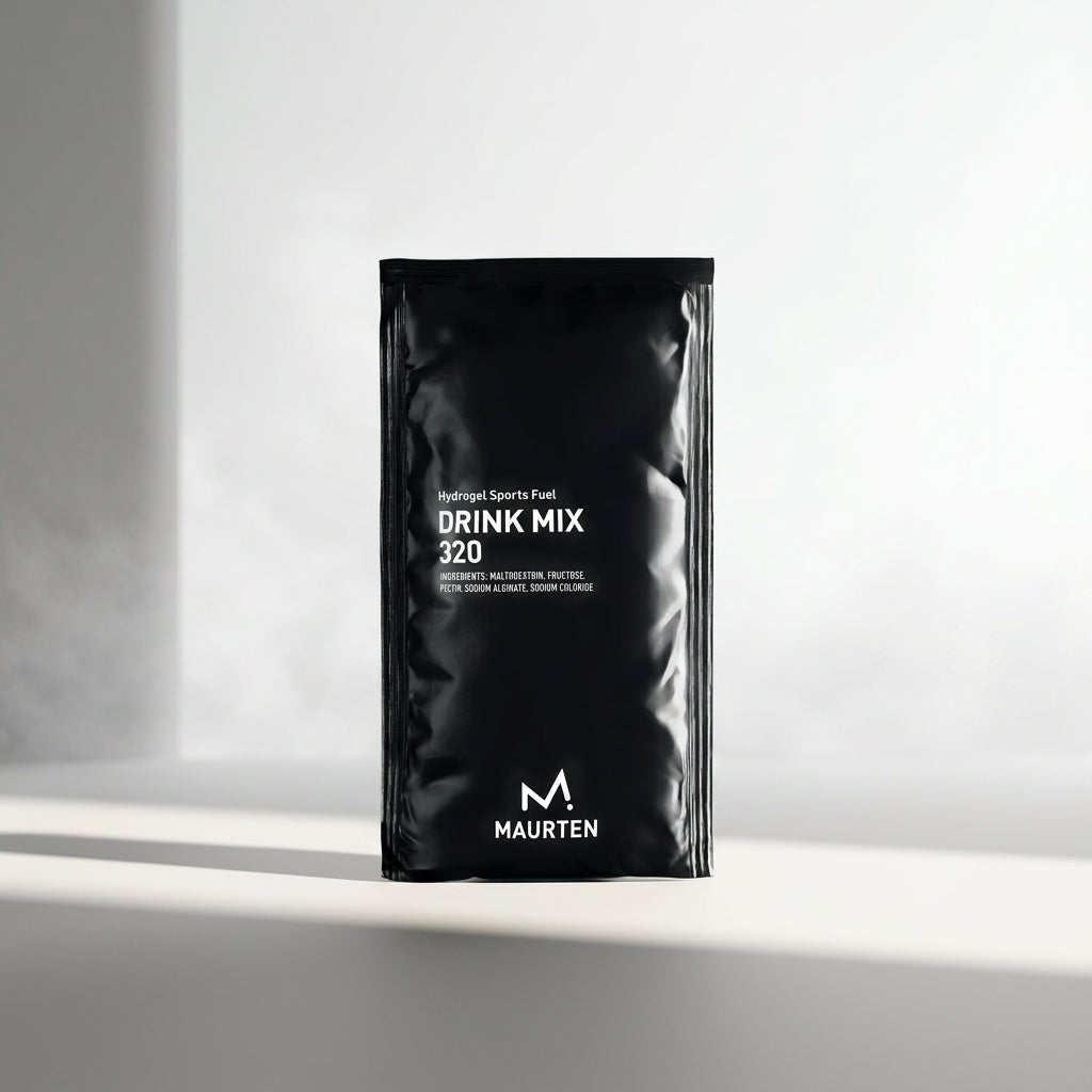Two superfuel drink mixes standing up next to each other on a bench with a blurred background
