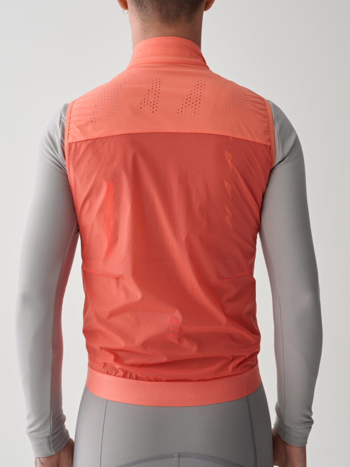MAAP Team Flow Vest in Tangelo, bonded armhole detail